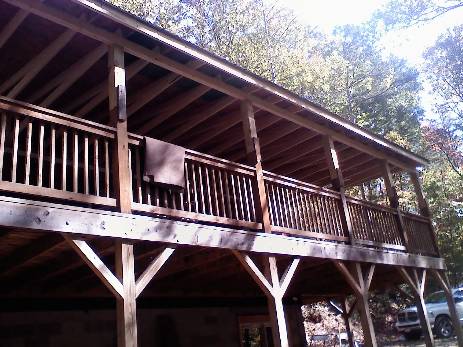 Timber framing under a new elevated porch and deck — Roof Leak Repair in Whipple by Roofing Brothers